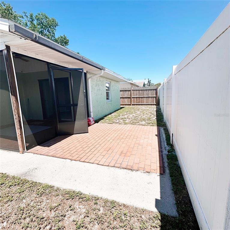 3208 Timberline Road Winter Haven, FL 33880 - Photo 16 of 21 a bedroom with a bed and a dresser