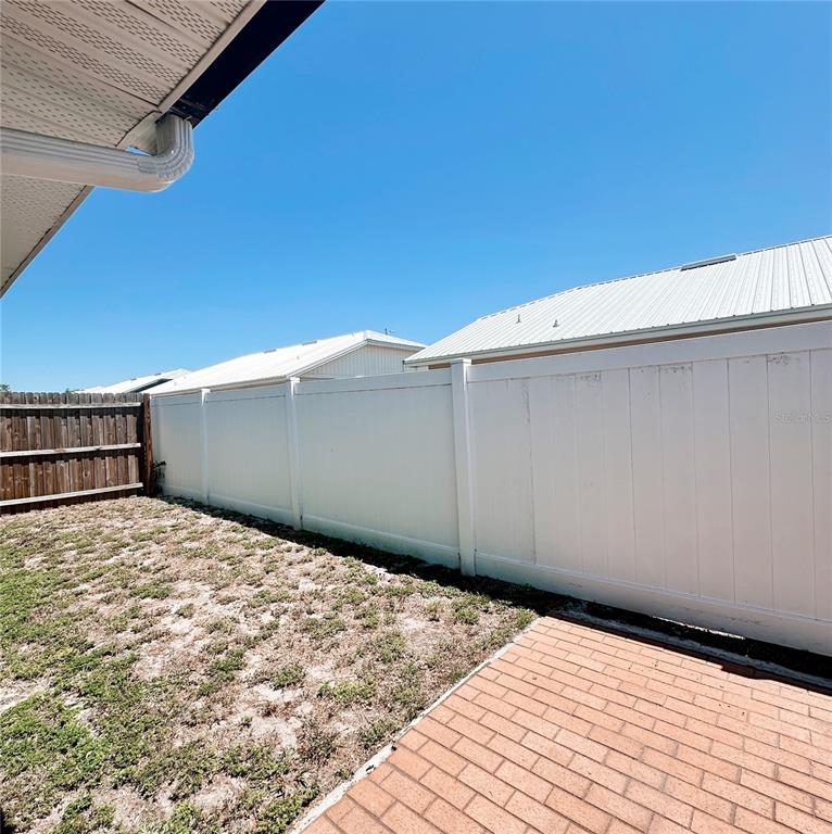 3208 Timberline Road Winter Haven, FL 33880 - Photo 19 of 21 a backyard of a house