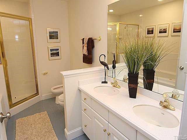 645 Neodak Road Apex, NC 27523 - Photo 7 of 12 Dual vanities, whirlpool tub separate shower, bidet