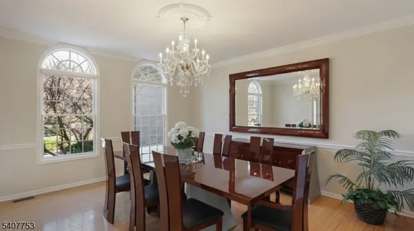 a kitchen with a stove a sink and a refrigerator