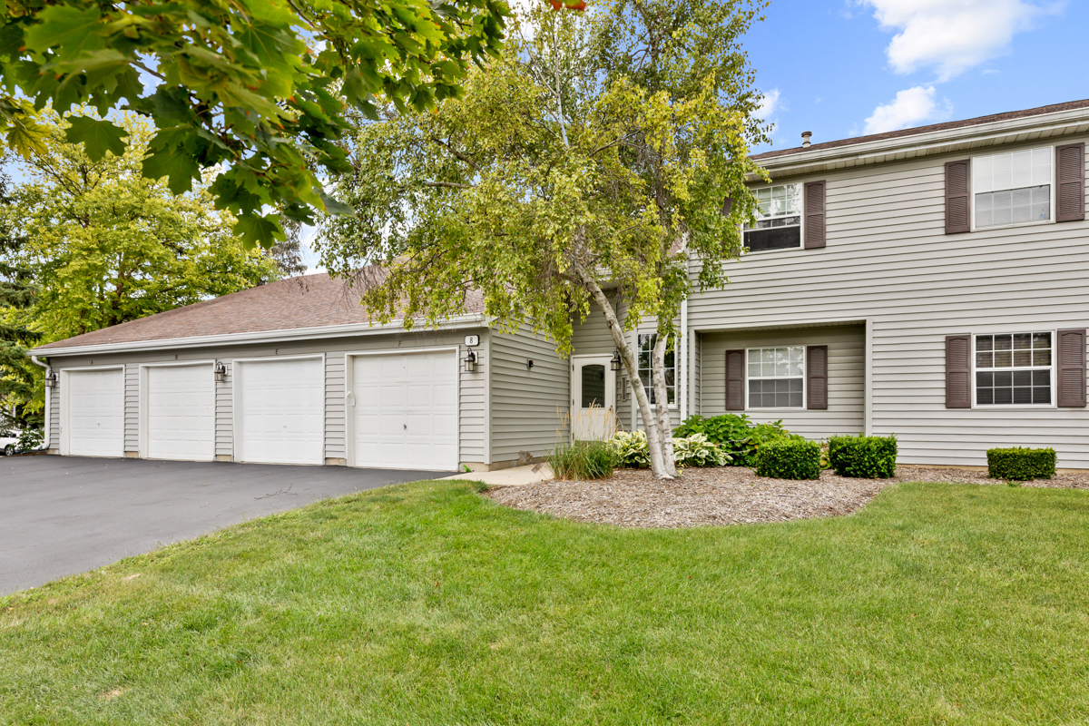 8 Gant Circle, Unit A Streamwood, IL 60107 - Photo 1 of 20 a front view of house with yard and green space