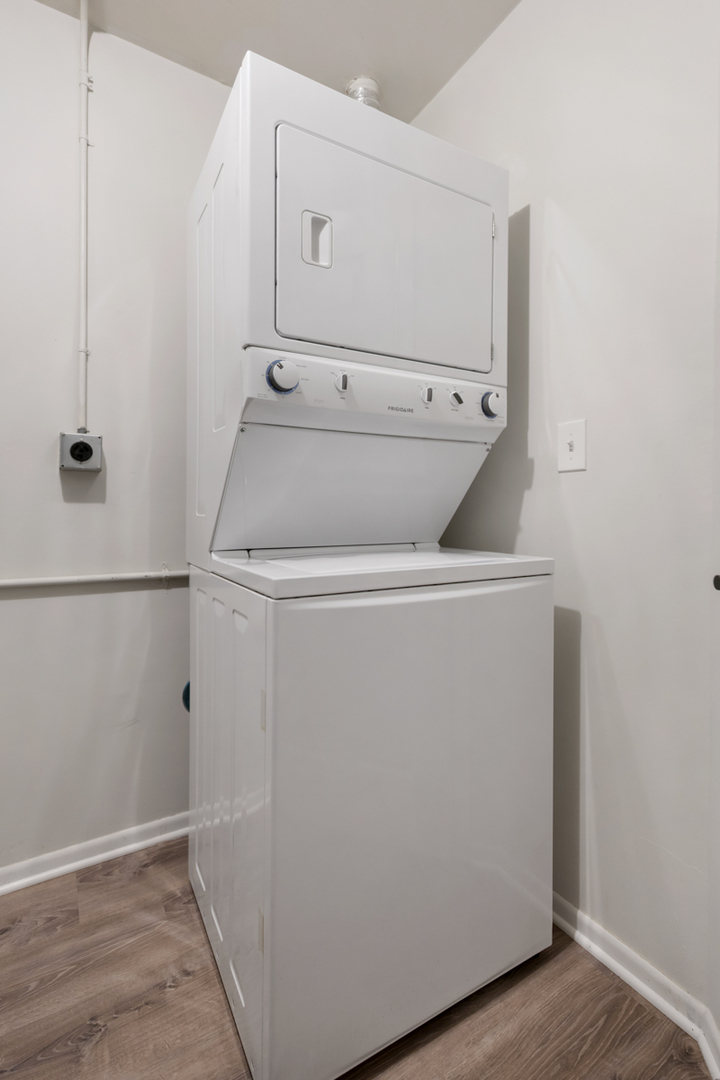 8 Gant Circle, Unit A Streamwood, IL 60107 - Photo 13 of 20 a utility room with dryer and washer