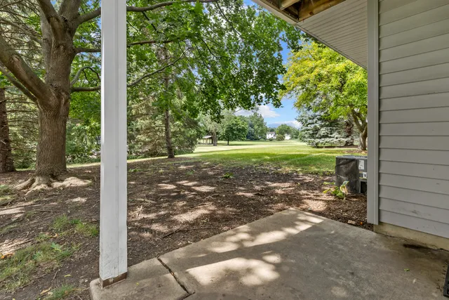 a view of a yard with an outdoor space
