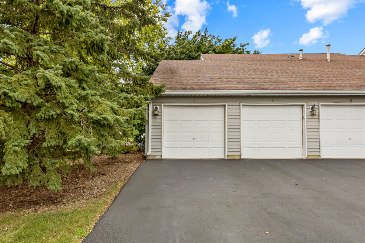 8 Gant Circle, Unit A Streamwood, IL 60107 - Photo 20 of 20 a view of a house with a garage