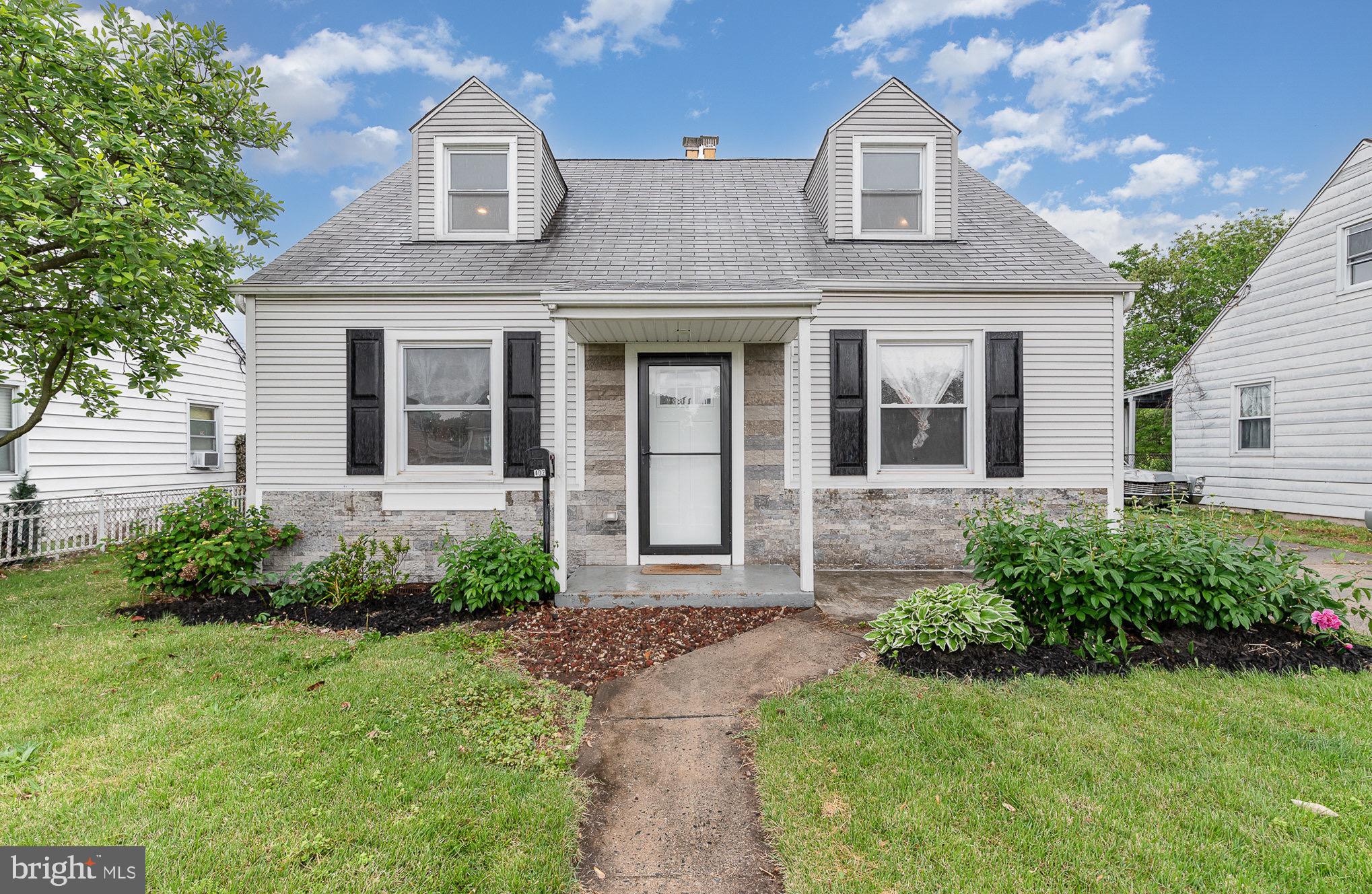 3402 Cornwall Road Dundalk, MD 21222 - Photo 1 of 25 a front view of a house with garden