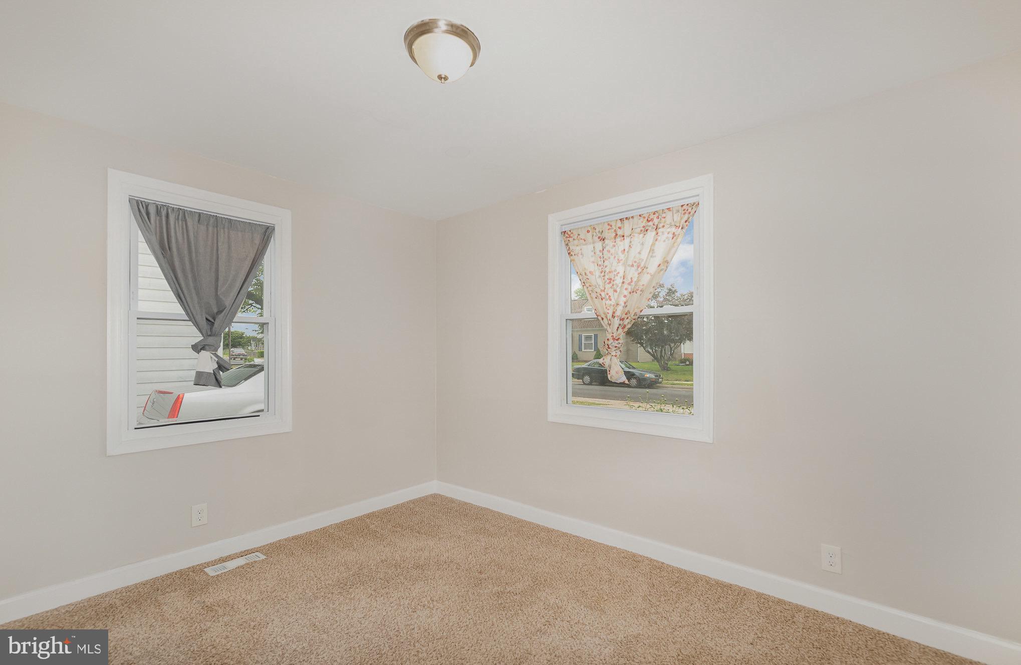 3402 Cornwall Road Dundalk, MD 21222 - Photo 14 of 25 an empty room with windows