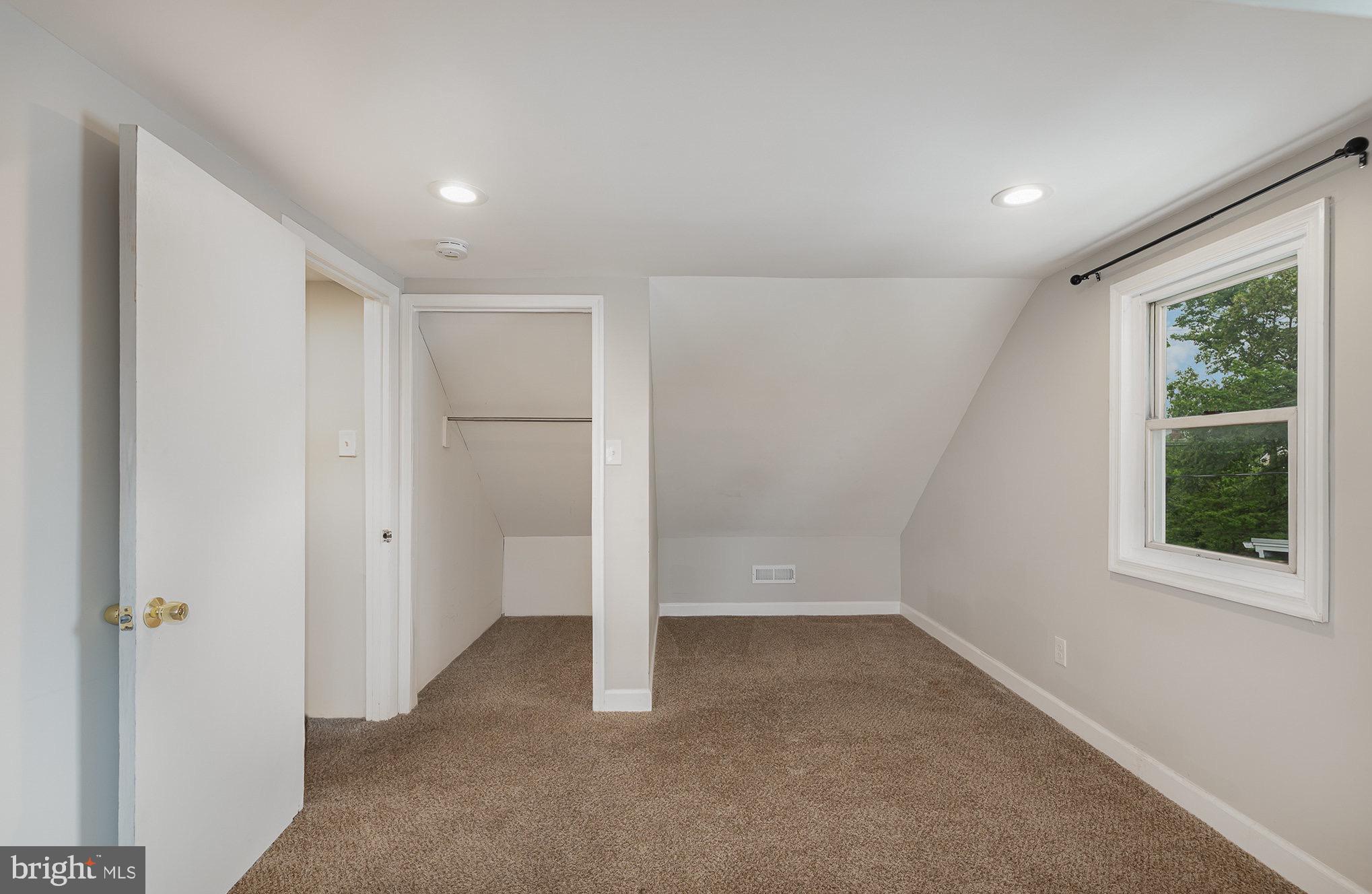 3402 Cornwall Road Dundalk, MD 21222 - Photo 18 of 25 a view of an empty room with a window