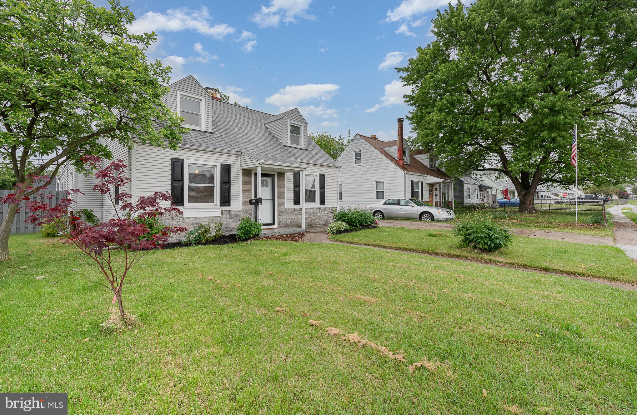 3402 Cornwall Road Dundalk, MD 21222 - Photo 2 of 25 a front view of house with yard and green space