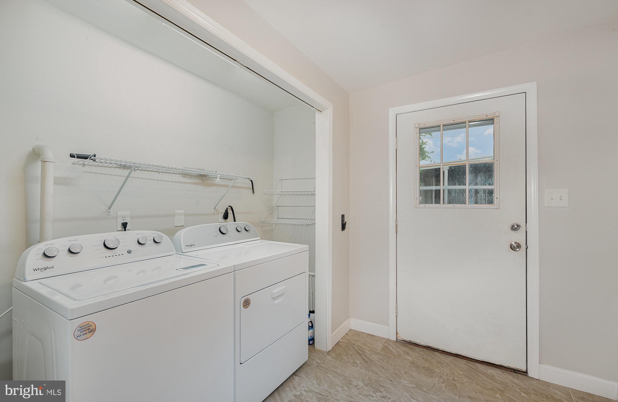 3402 Cornwall Road Dundalk, MD 21222 - Photo 23 of 25 a utility room with dryer and washer
