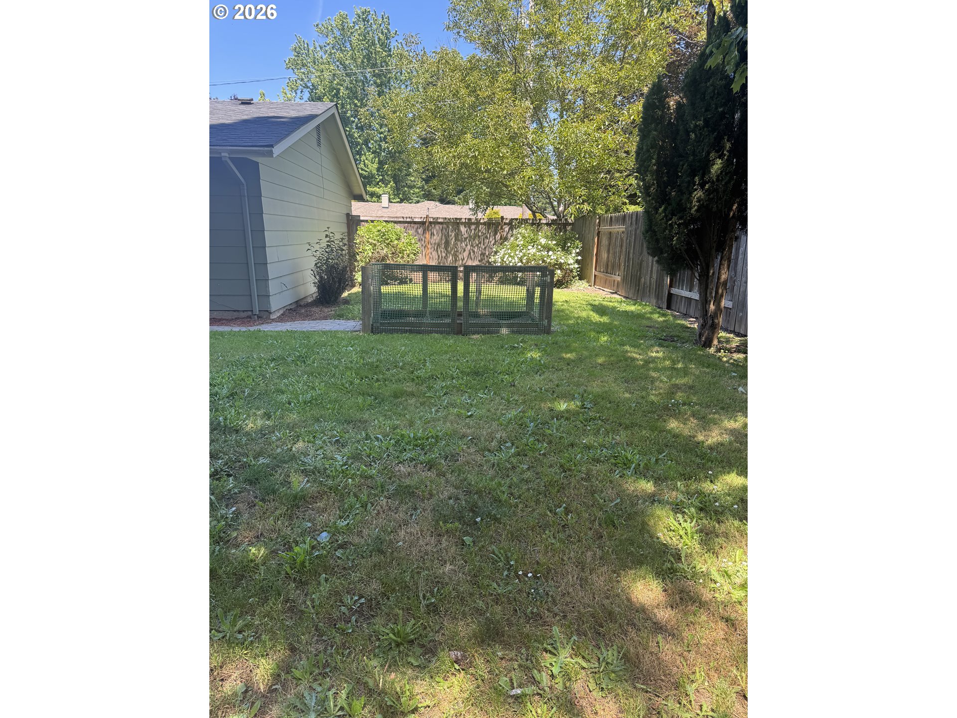 260 Susan Street Eugene, OR 97404 - Photo 27 of 33 a view of a bench in the garden