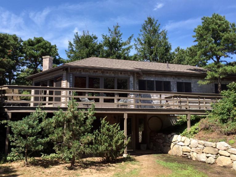 14 Sky View Drive Truro, MA 02666 - Photo 1 of 19 a front view of a house with swimming pool