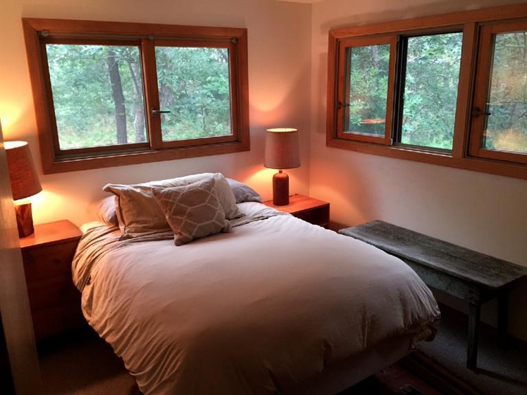 14 Sky View Drive Truro, MA 02666 - Photo 14 of 19 a bedroom with a bed and window