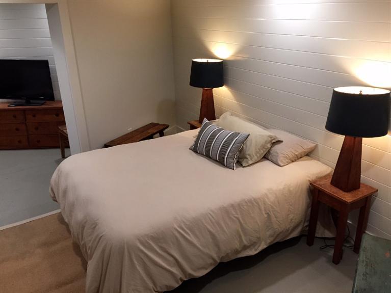 14 Sky View Drive Truro, MA 02666 - Photo 16 of 19 a bedroom with a bed and a lamp