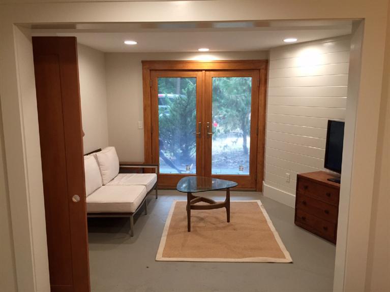 14 Sky View Drive Truro, MA 02666 - Photo 17 of 19 a living room with furniture and a large window