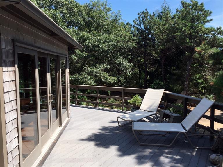 14 Sky View Drive Truro, MA 02666 - Photo 2 of 19 a view of chair and tables in the balcony