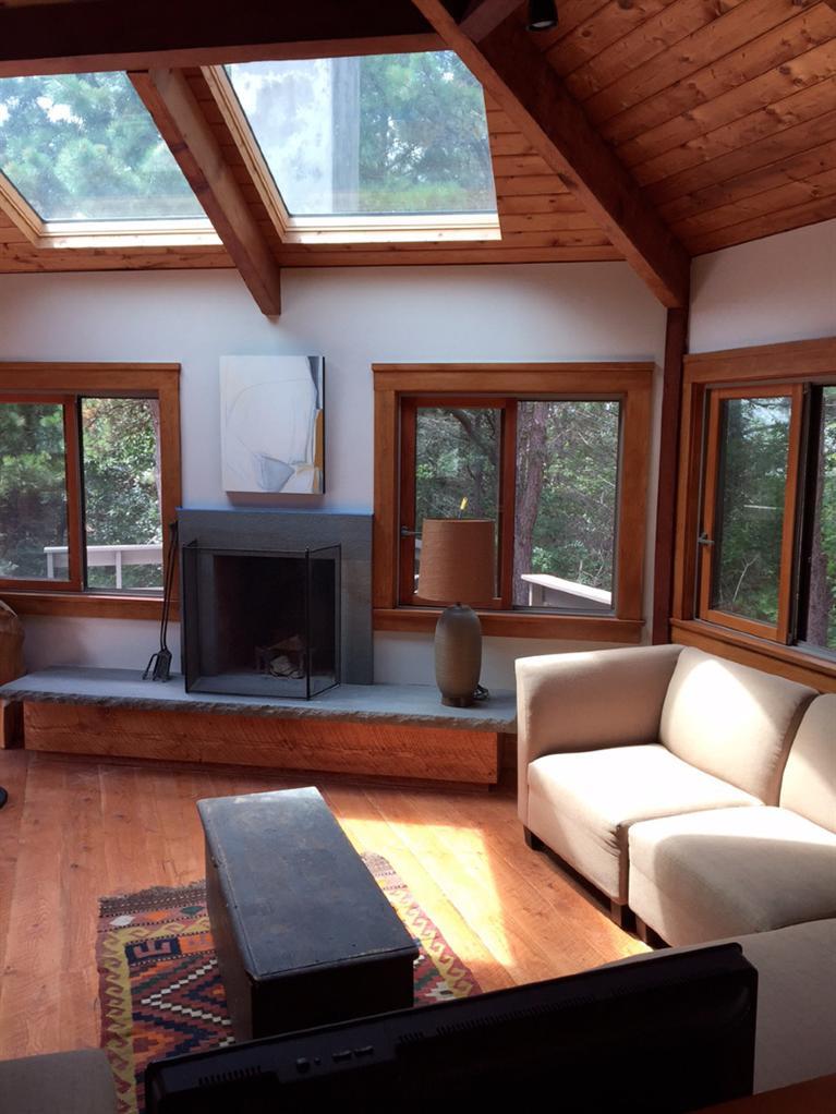 14 Sky View Drive Truro, MA 02666 - Photo 4 of 19 a living room with furniture and a fireplace