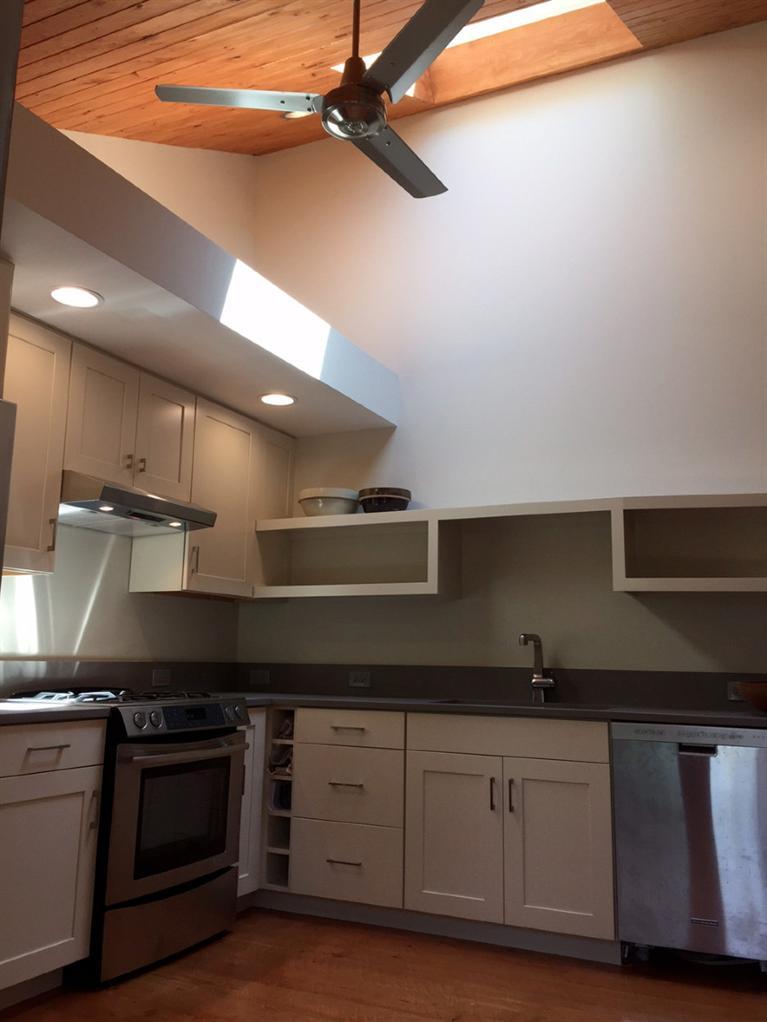 14 Sky View Drive Truro, MA 02666 - Photo 6 of 19 a kitchen with granite countertop a stove and a sink