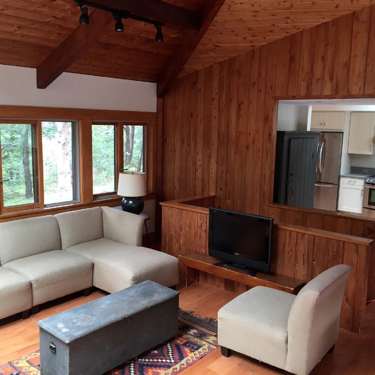 14 Sky View Drive Truro, MA 02666 - Photo 7 of 19 a living room with furniture and a fireplace