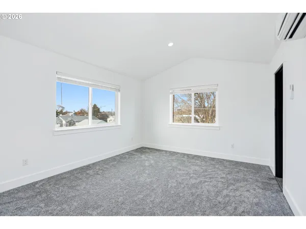 an empty room with windows