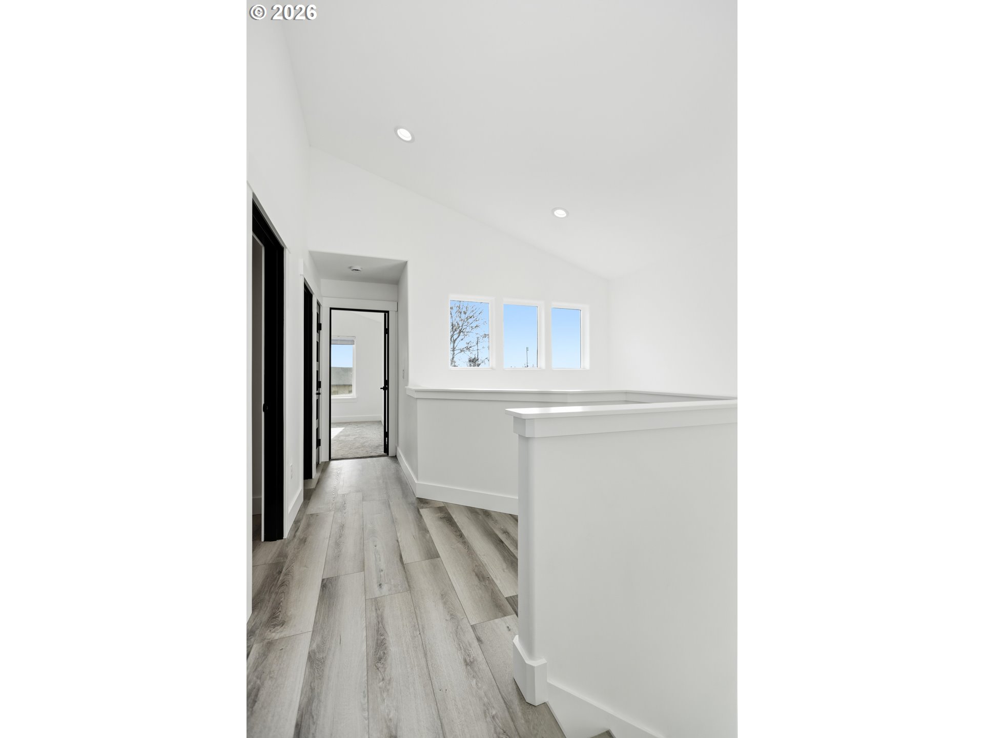 511 East Collins Street Goldendale, WA 98620 - Photo 20 of 41 a view of a hallway with two windows