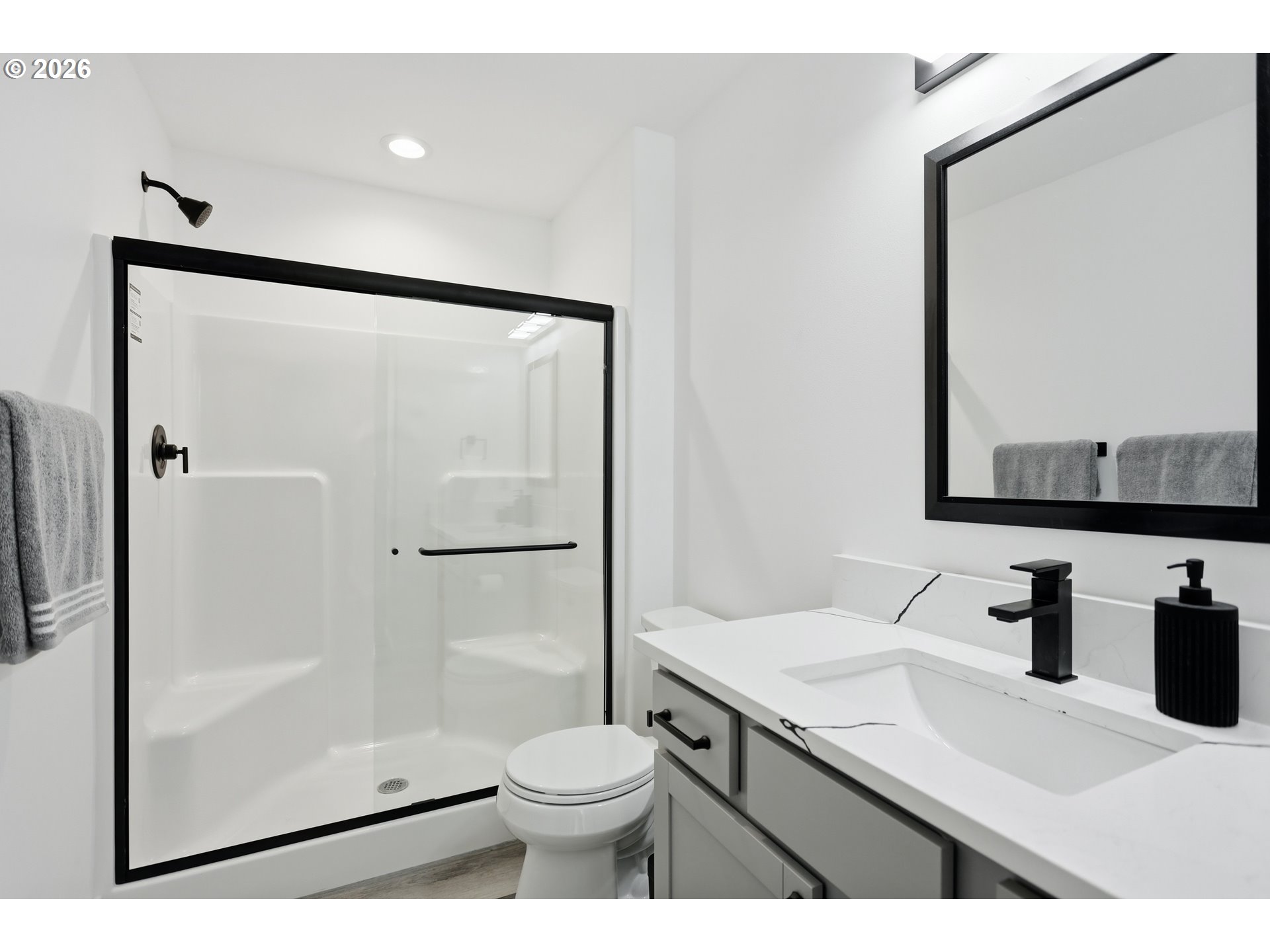 511 East Collins Street Goldendale, WA 98620 - Photo 26 of 41 a bathroom with a sink a toilet and shower