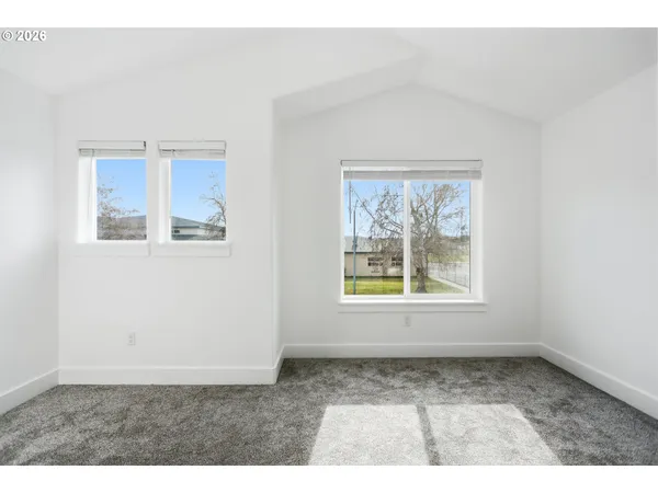 an empty room with windows