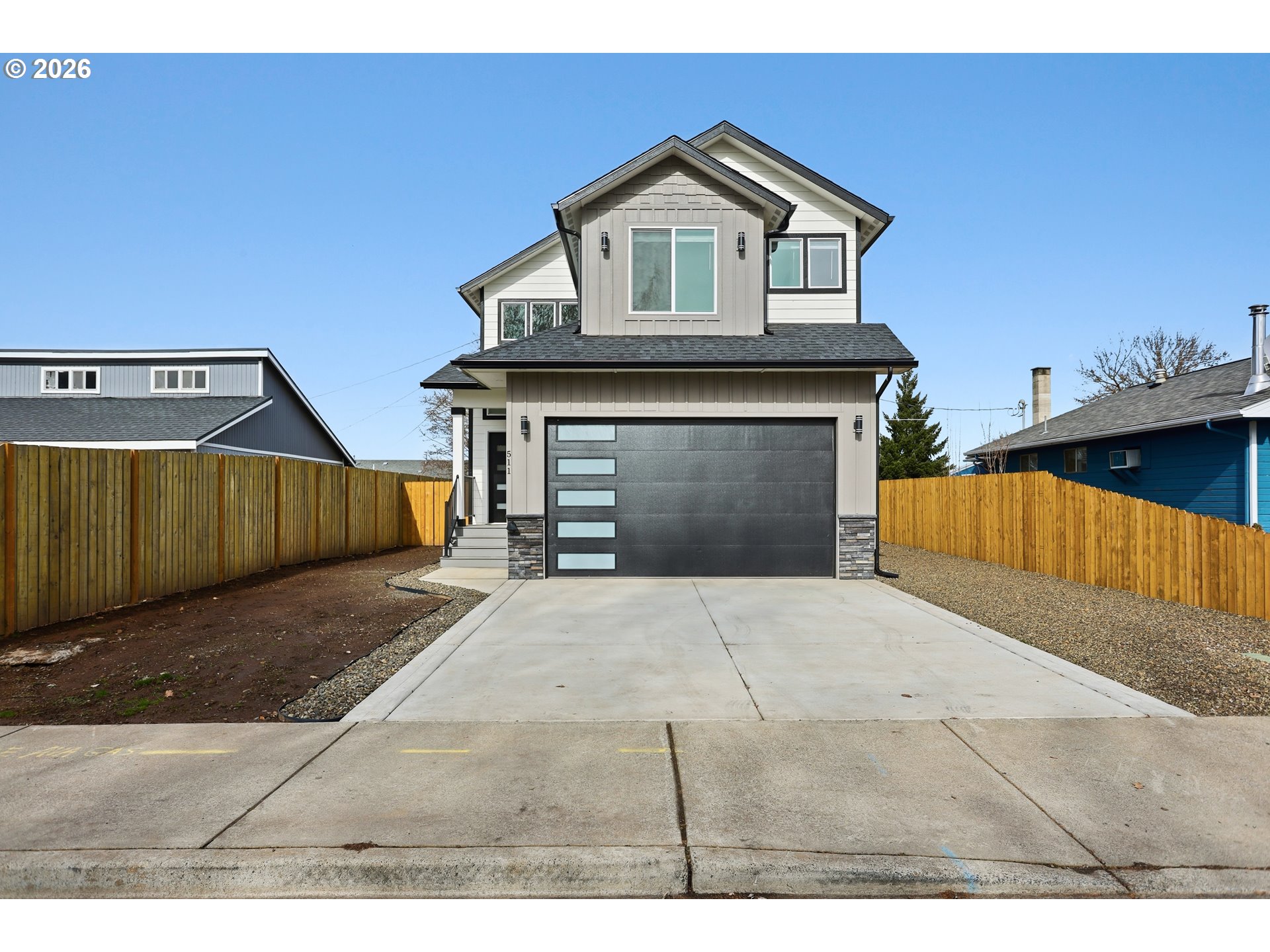 511 East Collins Street Goldendale, WA 98620 - Photo 38 of 41 a front view of a house with a garage