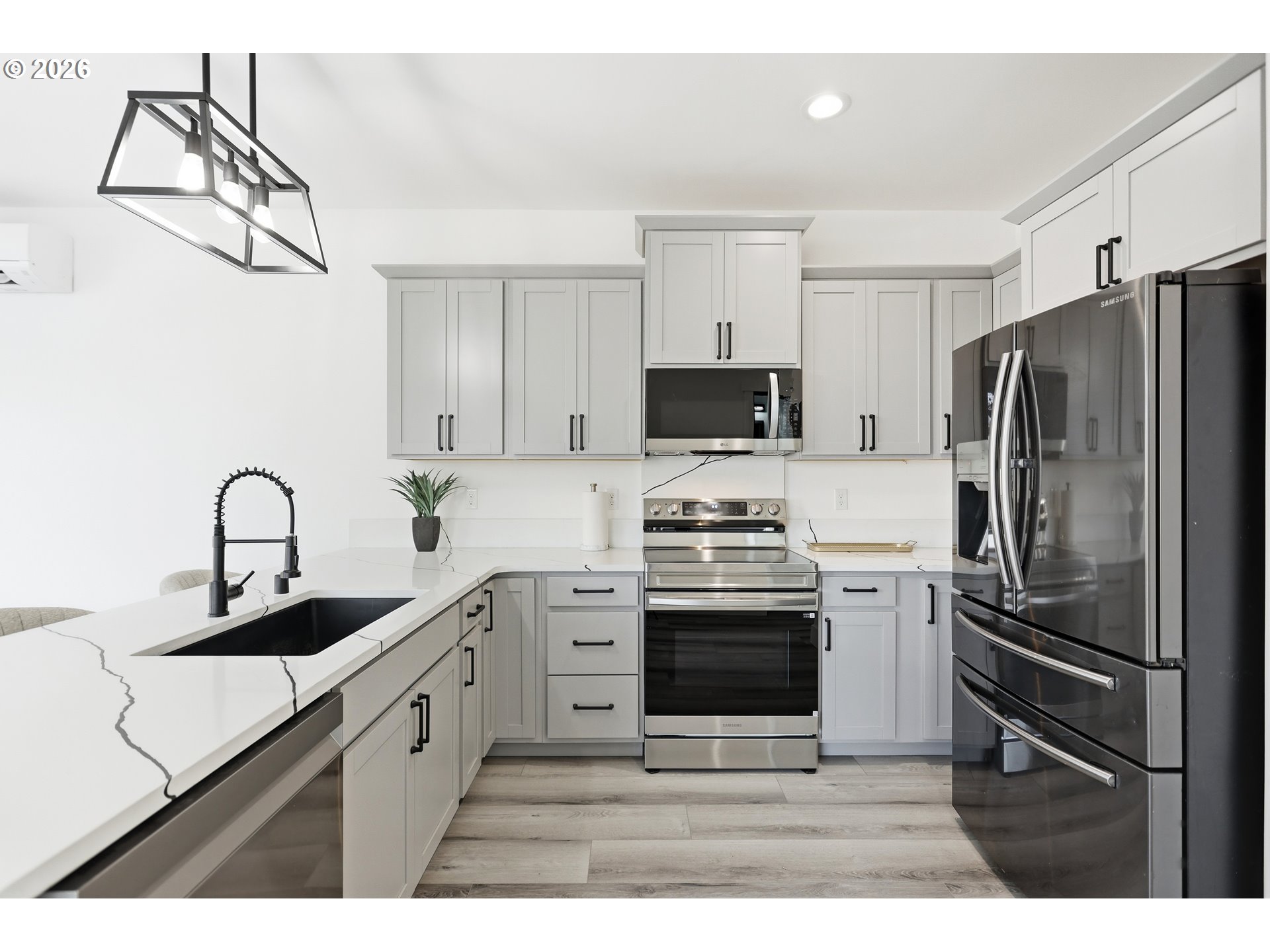 511 East Collins Street Goldendale, WA 98620 - Photo 10 of 41 a kitchen with a sink stainless steel appliances and cabinets
