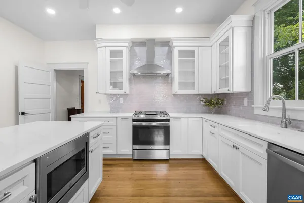 a view of a hallway with seating area