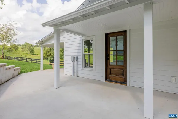 a view of a swimming pool with a garden
