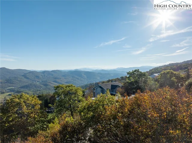 an aerial view of a town with couple of houses