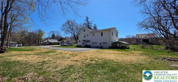 a front view of house with a yard