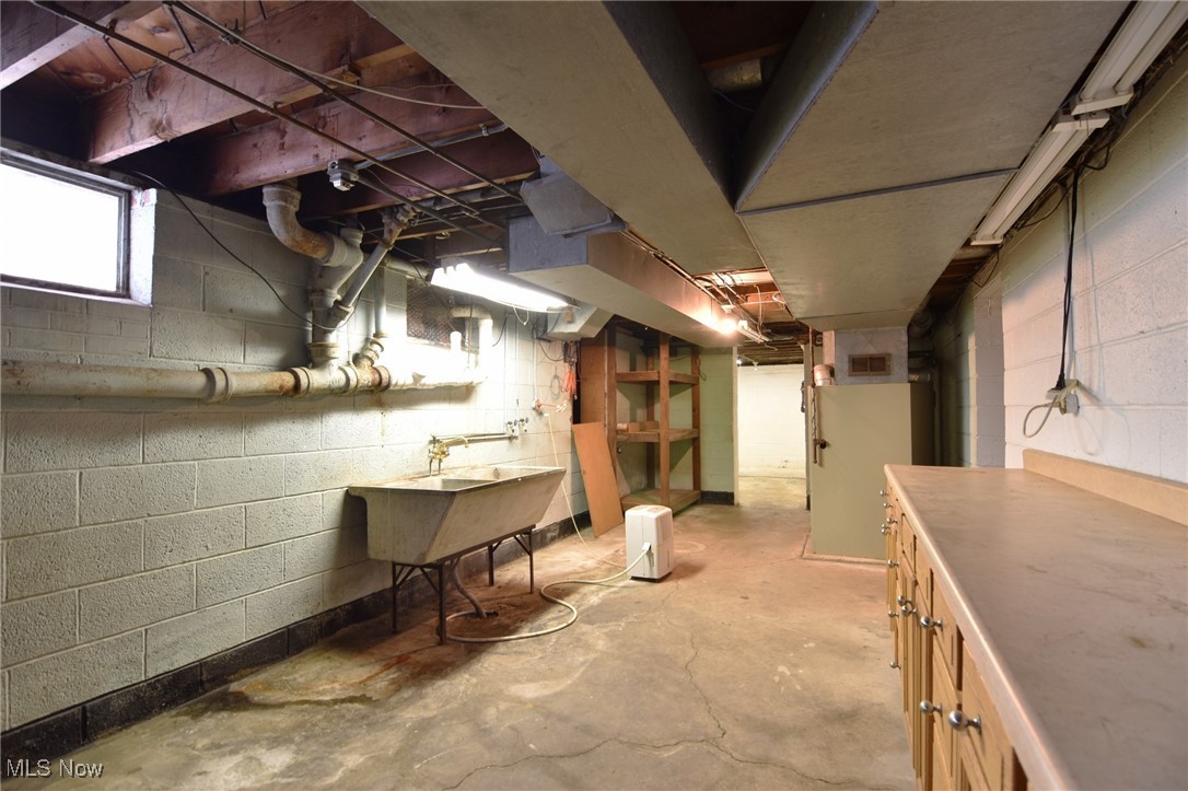 6308 Highland Road Cleveland, OH 44143 - Photo 36 of 40 Below grade area with visible vents and a sink