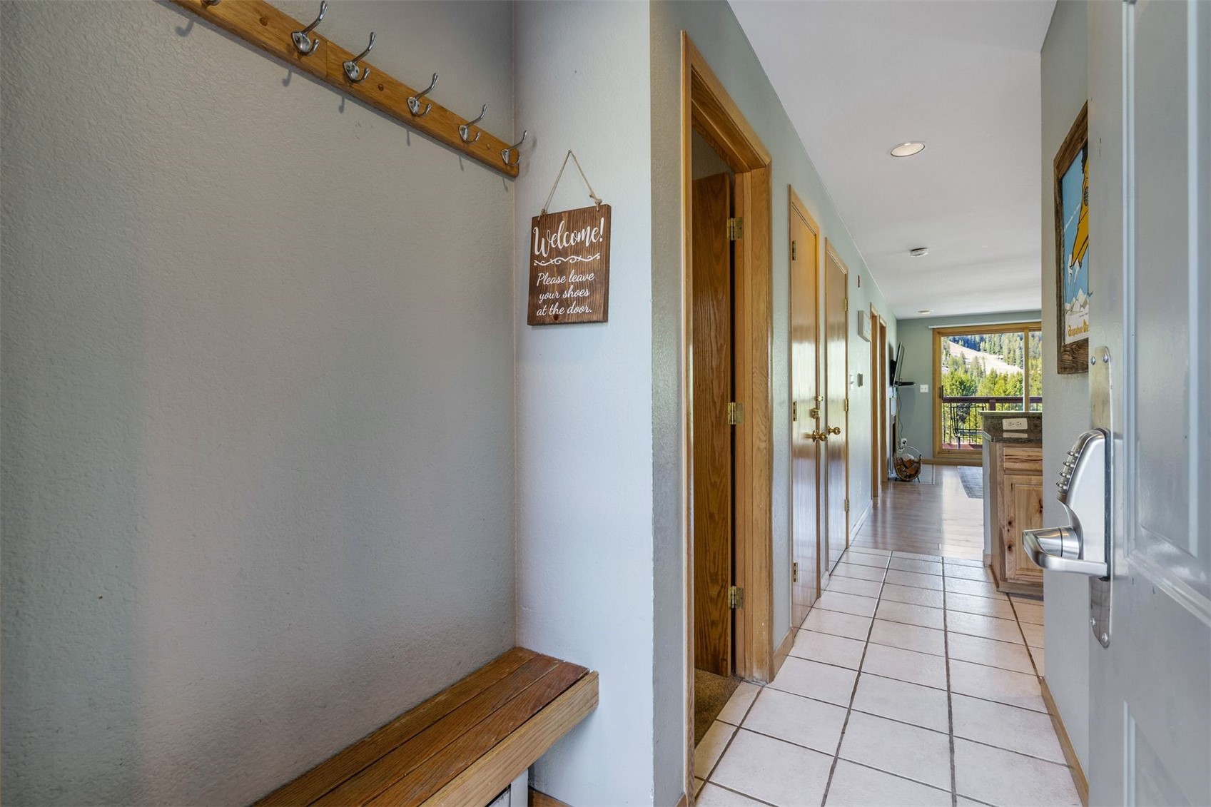 60 Oro Grande Road, Unit 204 Keystone, CO 80435 - Photo 26 of 50 a hallway with wooden floor