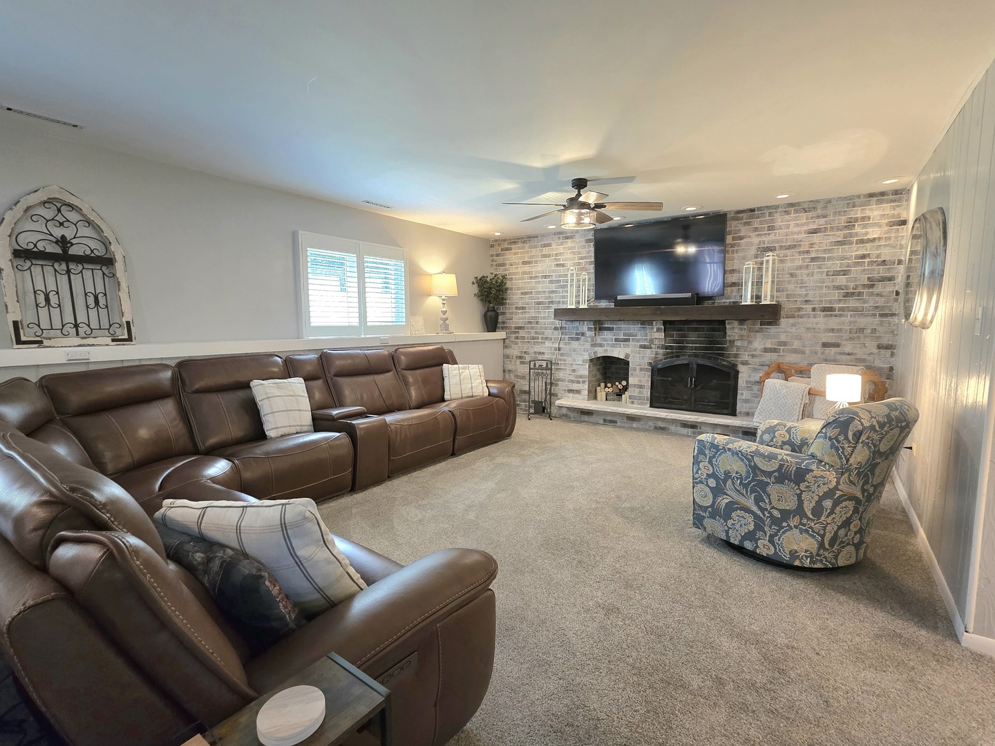 574 Aberdeen Road Frankfort, IL 60423 - Photo 14 of 37 a living room with furniture a flat screen tv and a fireplace