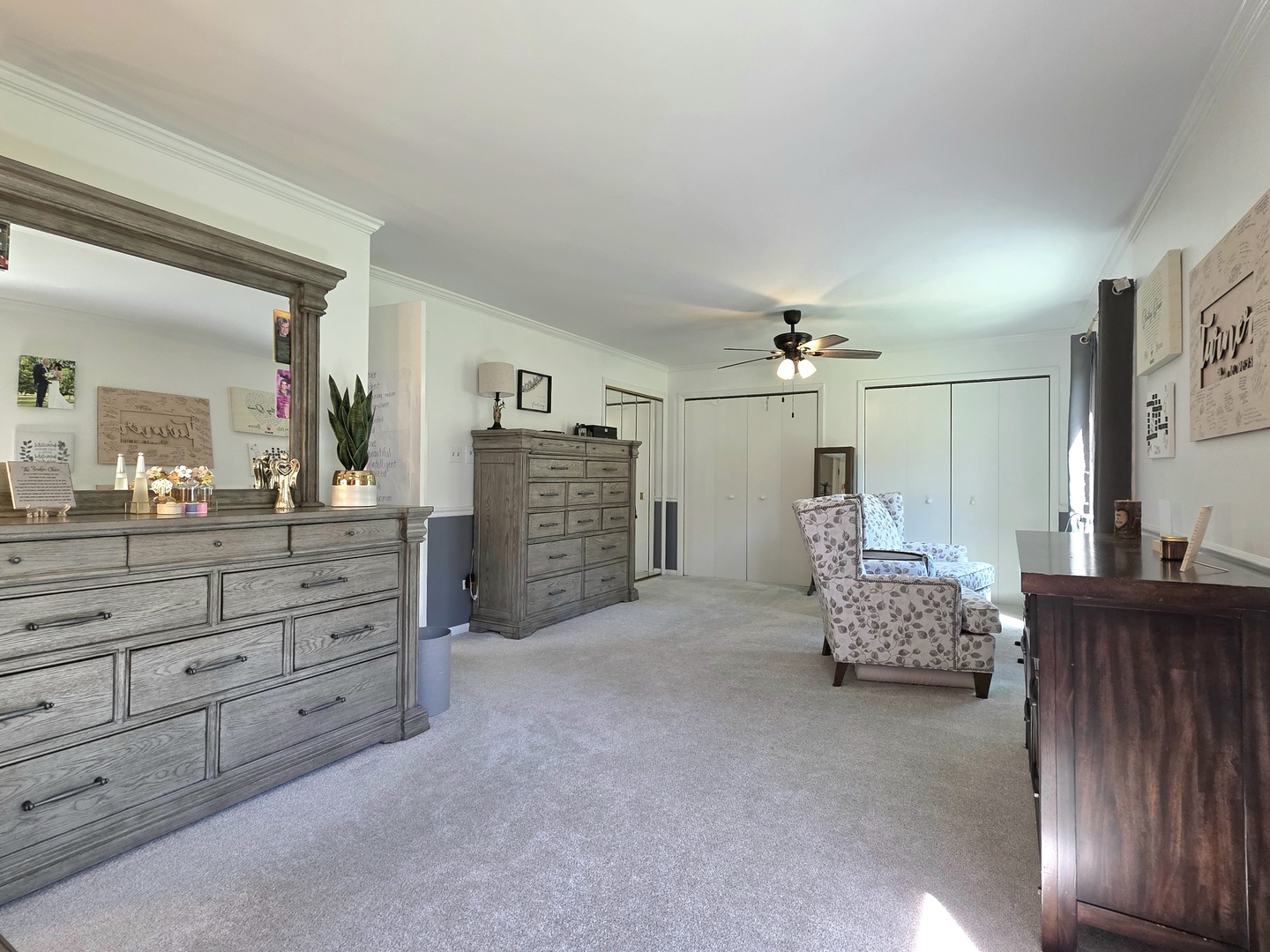 574 Aberdeen Road Frankfort, IL 60423 - Photo 22 of 37 a living room with furniture cabinets and flat screen tv