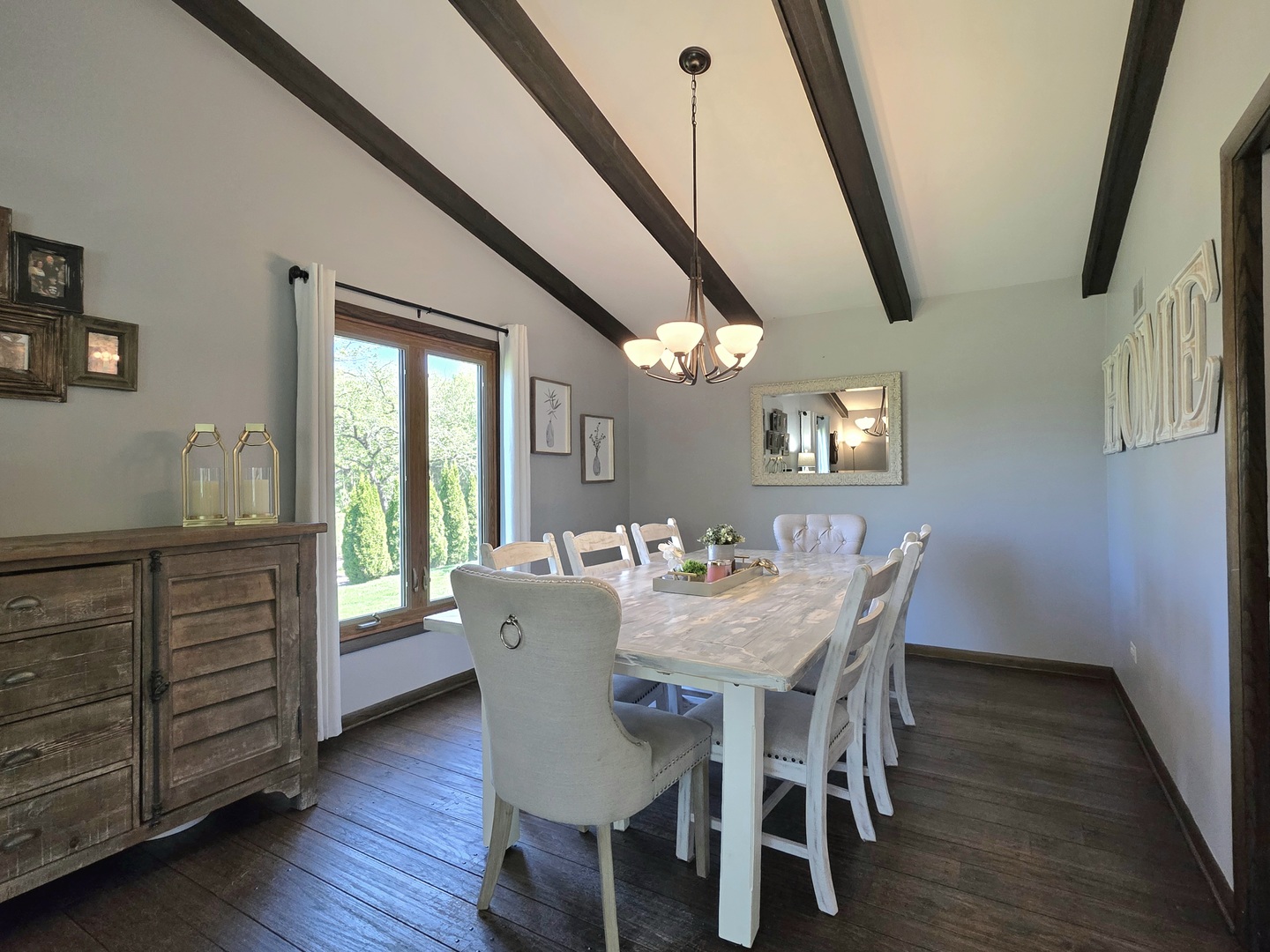 574 Aberdeen Road Frankfort, IL 60423 - Photo 9 of 37 a view of a dining room with furniture and wooden floor