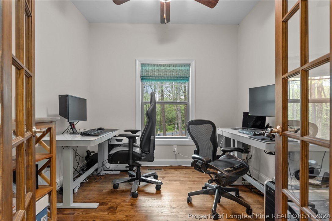 208 Rob Roy Road Southern Pines, NC 28387 - Photo 19 of 48 a view of a workspace with furniture and a window