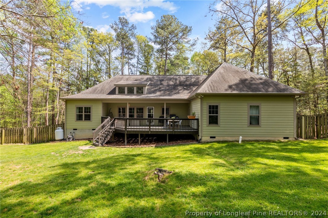 208 Rob Roy Road Southern Pines, NC 28387 - Photo 40 of 48 a view of a house with a yard and sitting area