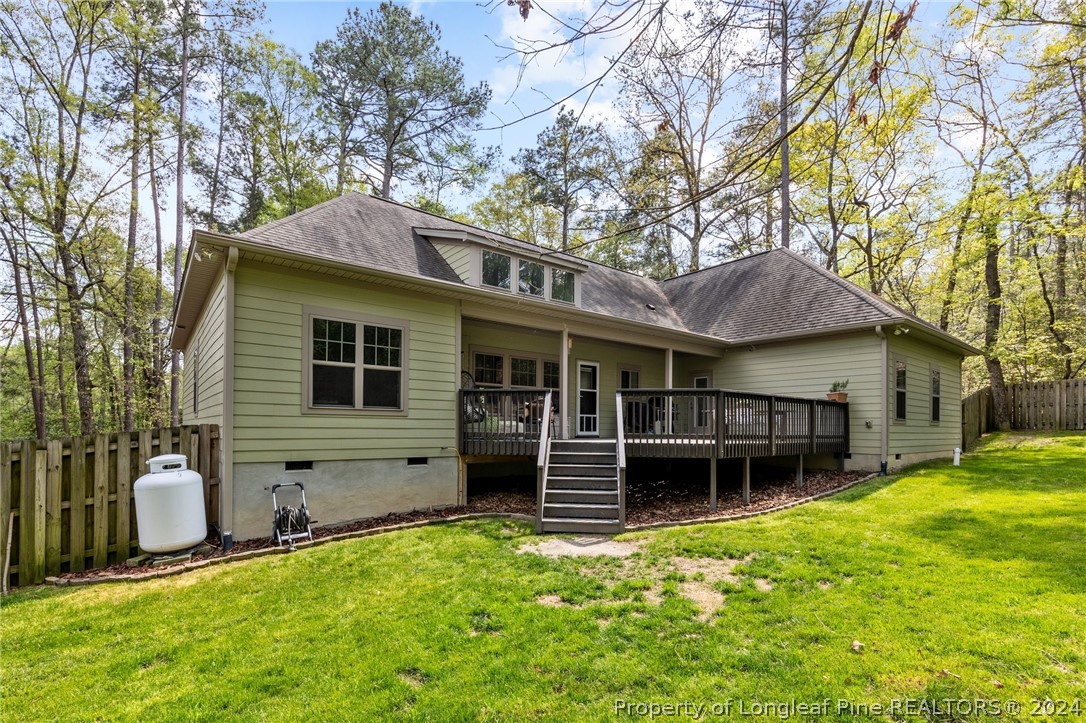208 Rob Roy Road Southern Pines, NC 28387 - Photo 41 of 48 a view of a house with a yard and tree