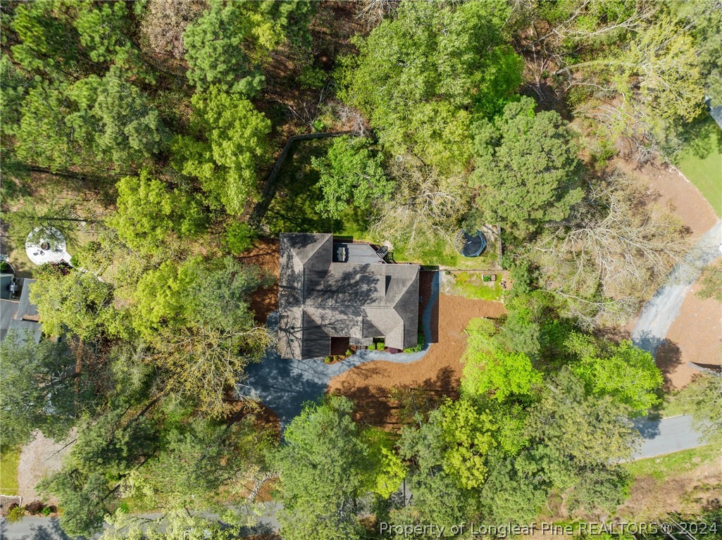 208 Rob Roy Road Southern Pines, NC 28387 - Photo 47 of 48 an aerial view of a house with a yard