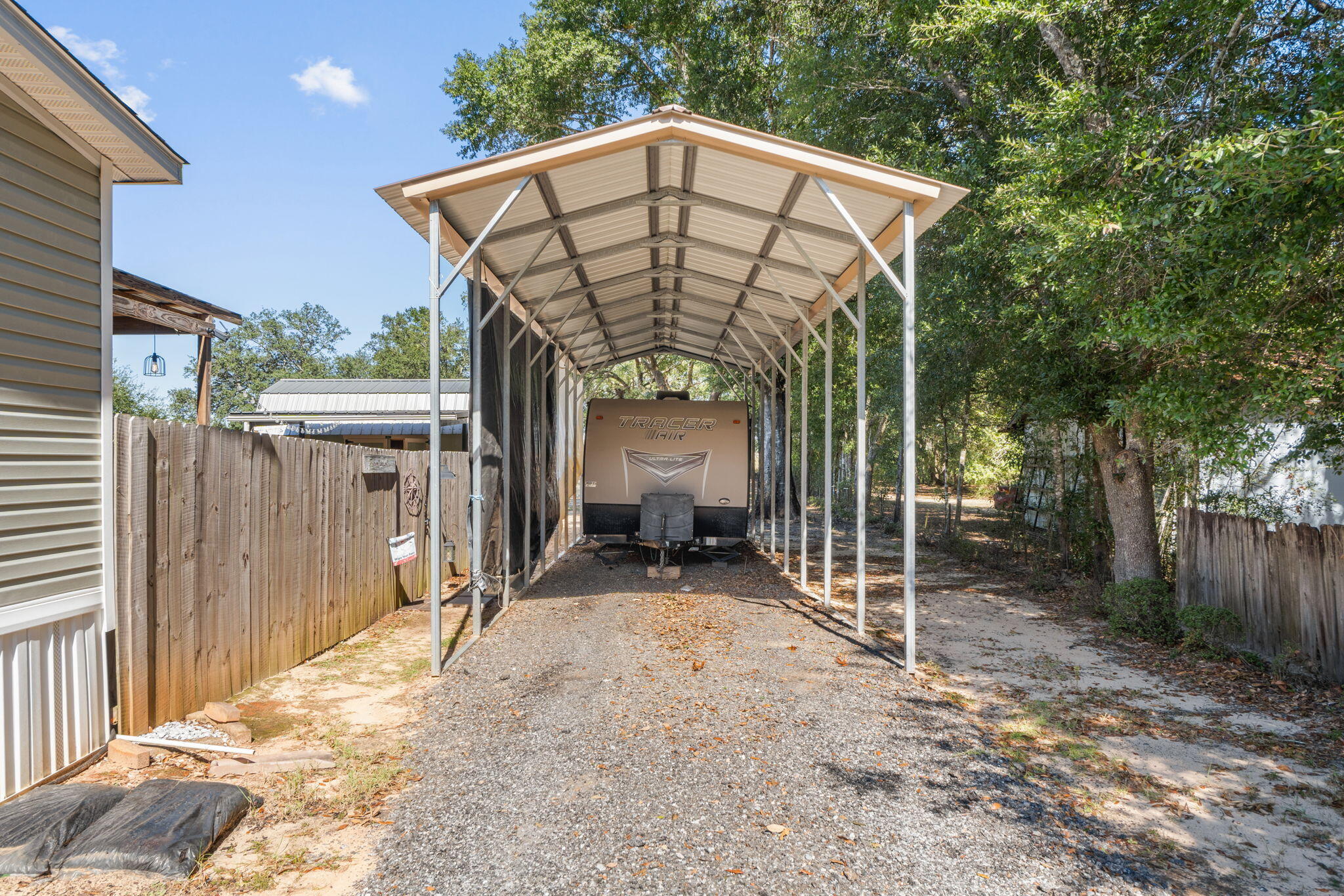 8680 John Hamm Road Milton, FL 32583 - Photo 36 of 44 a view of a entrance gate of a house