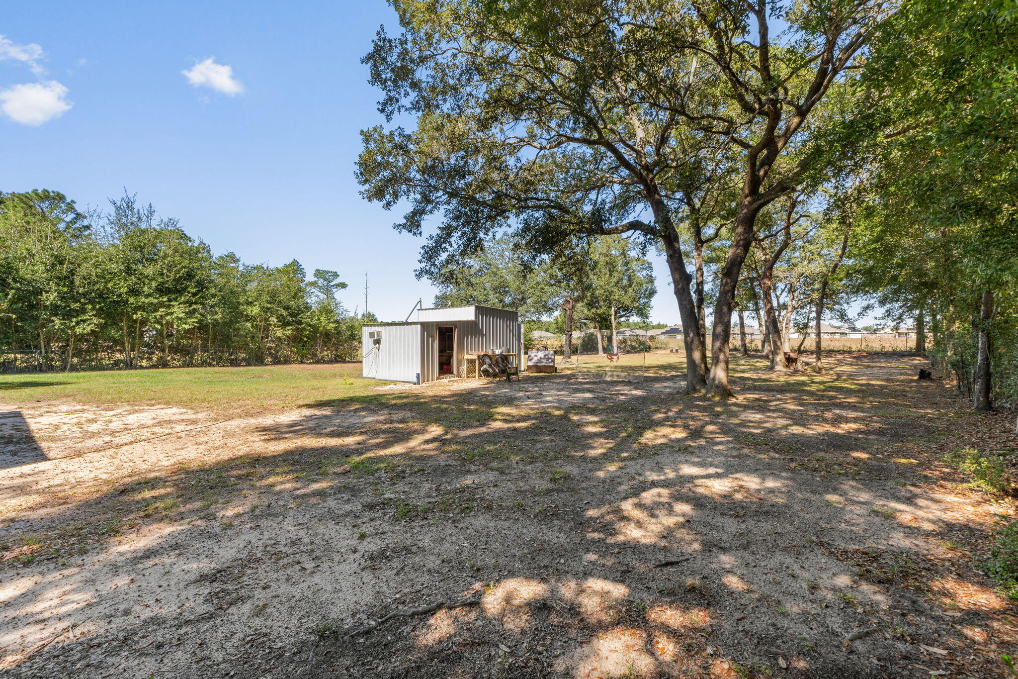 8680 John Hamm Road Milton, FL 32583 - Photo 37 of 44 a view of road with trees