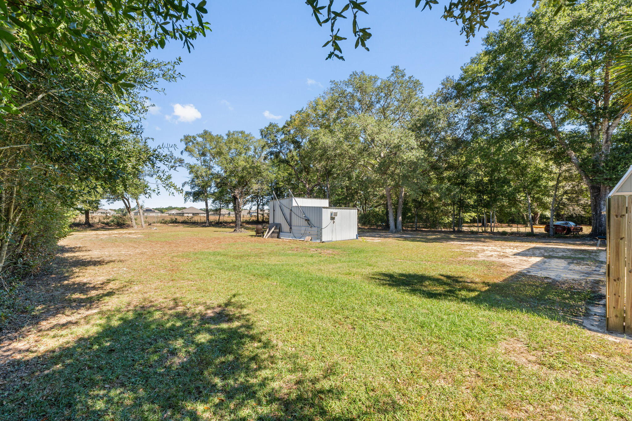 8680 John Hamm Road Milton, FL 32583 - Photo 39 of 44 a view of a yard with swimming pool