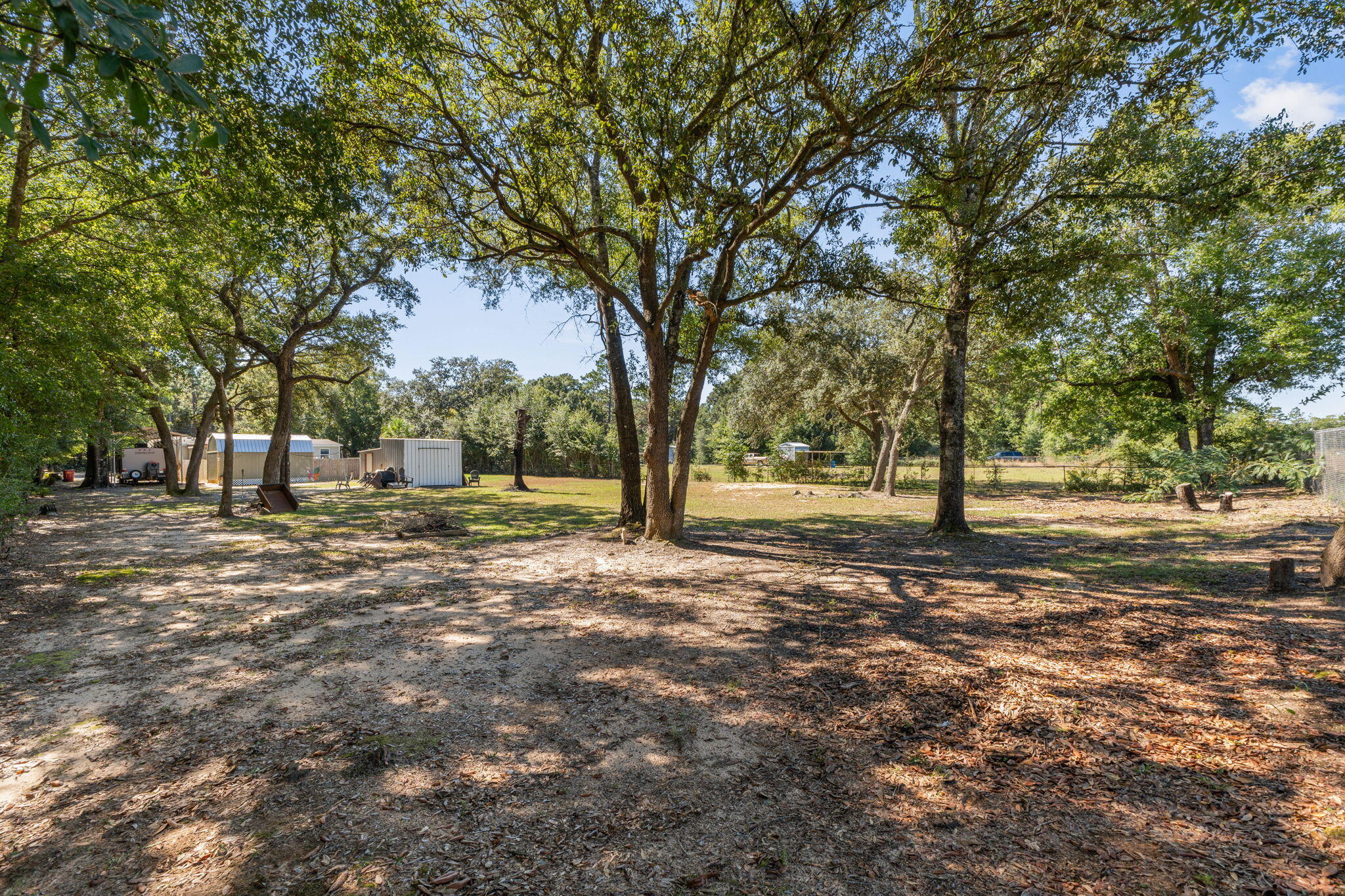 8680 John Hamm Road Milton, FL 32583 - Photo 42 of 44 a view of outdoor space with trees