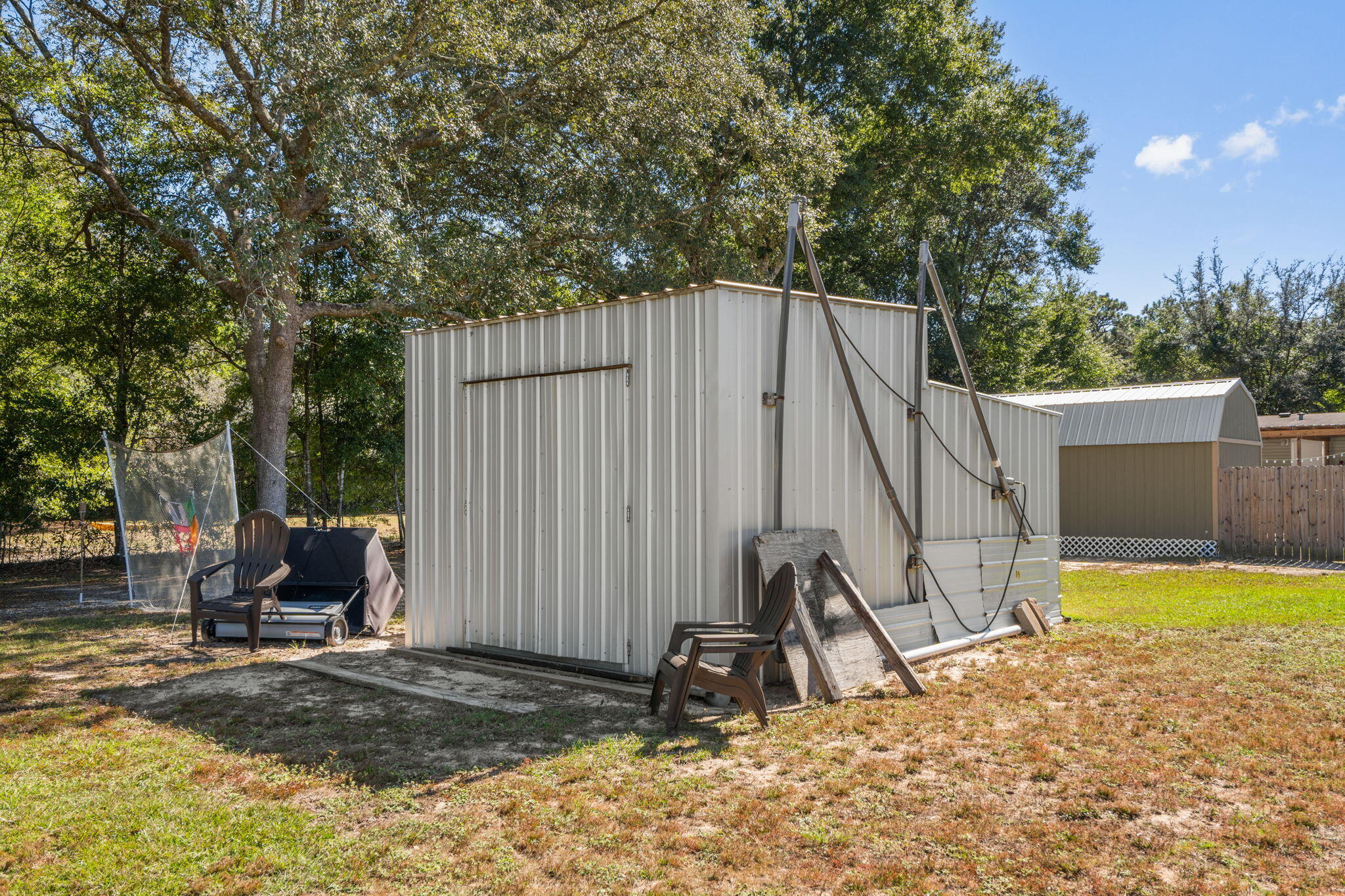 8680 John Hamm Road Milton, FL 32583 - Photo 43 of 44 a view of a backyard with a tree