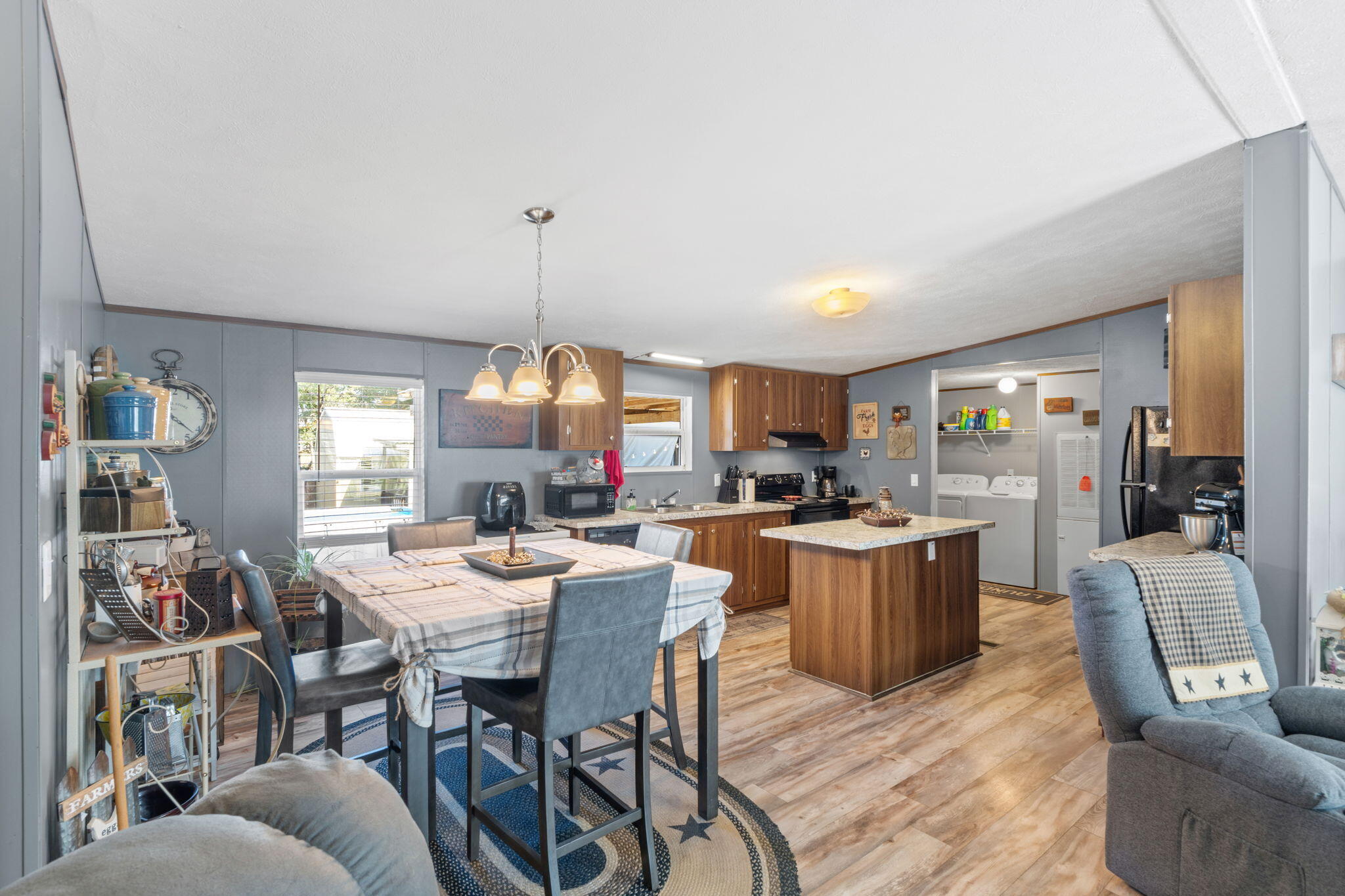 8680 John Hamm Road Milton, FL 32583 - Photo 10 of 44 a dining room with furniture and window