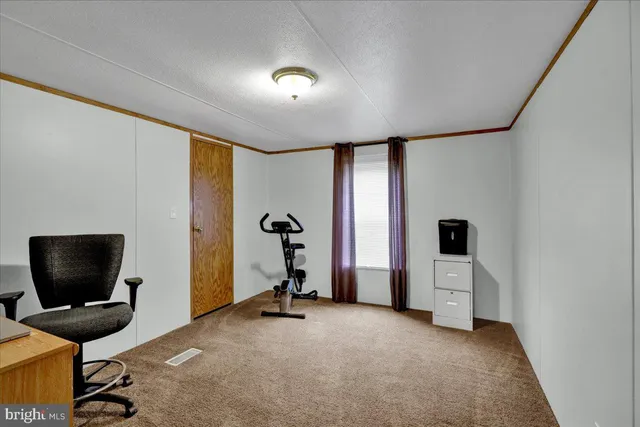 a view of a livingroom with a flat screen tv