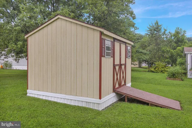 a view of backyard with green space