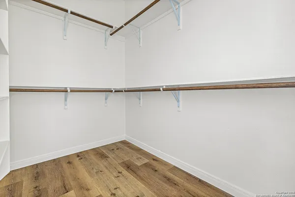 a view of a room with racks on the wall